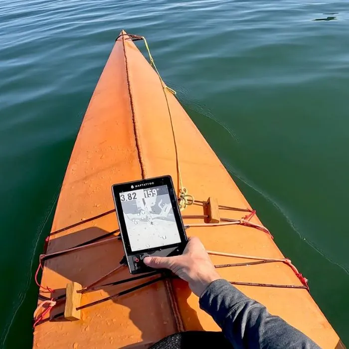 Anti glare Marine GPS tablet with E-ink screen on a kayak in sunlight. Usable with wet fingers.